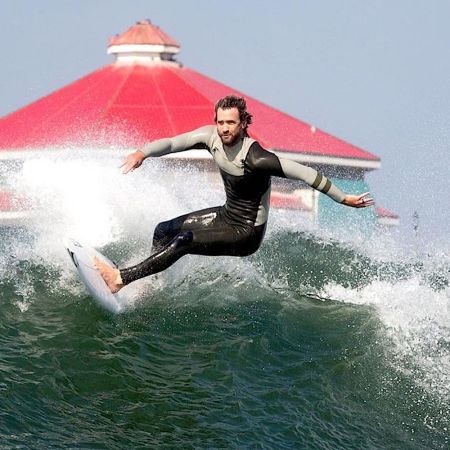 Brett Simpson surfing
