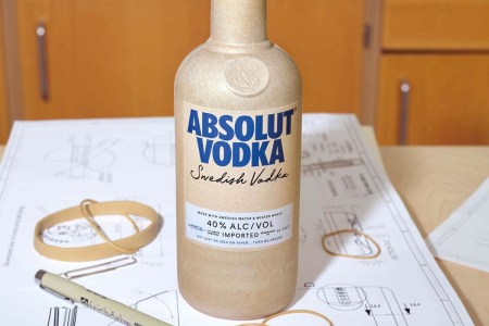 The new paper bottle for Absolut Vodka, sitting on a desk