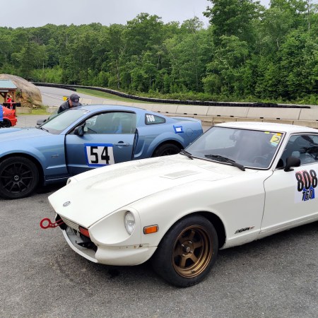 two racecars parked next to each other