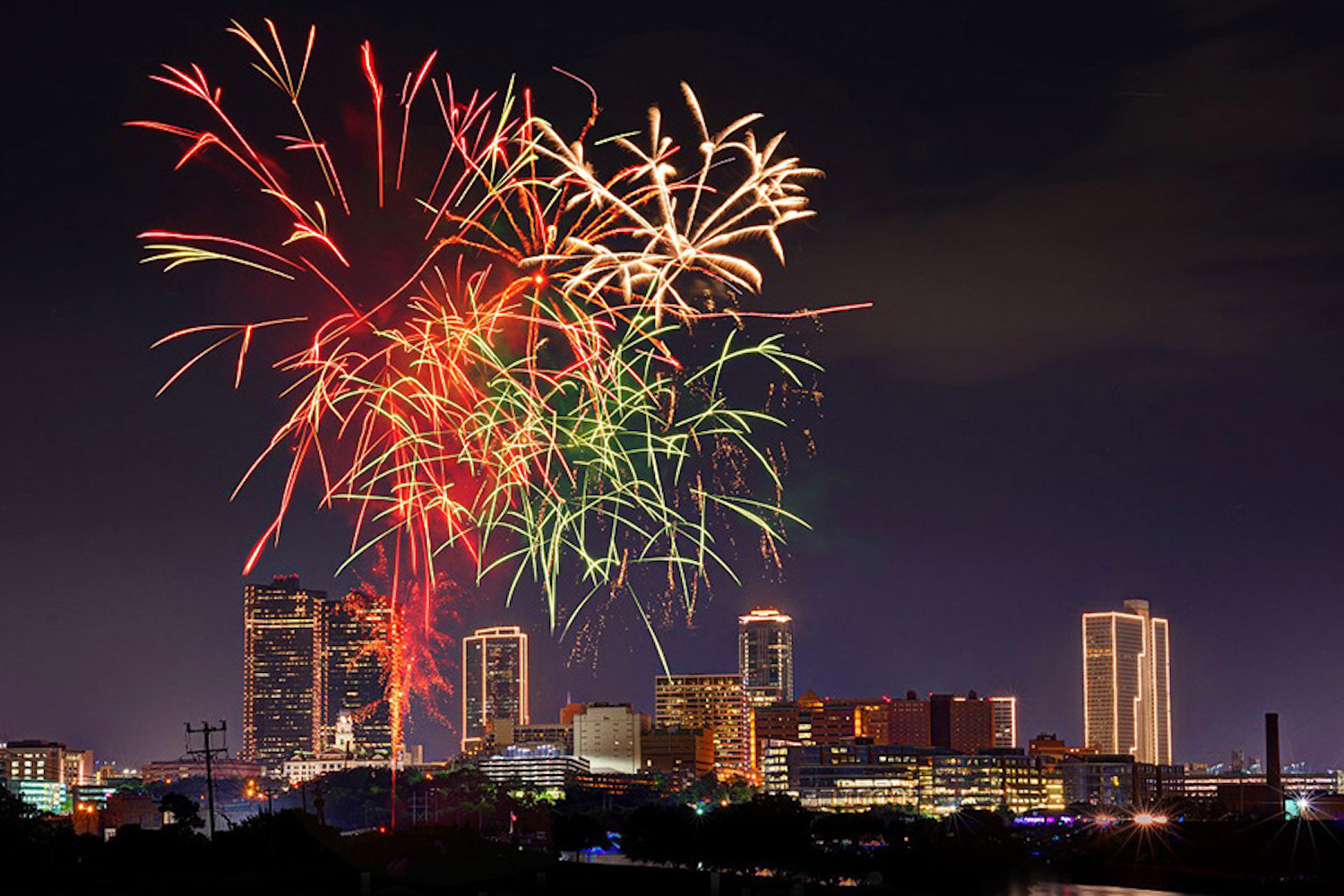 fireworks over city skyline