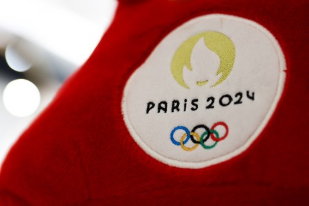 Paris 2024 Olympics logo is seen on the mascott in a store in Nice, France