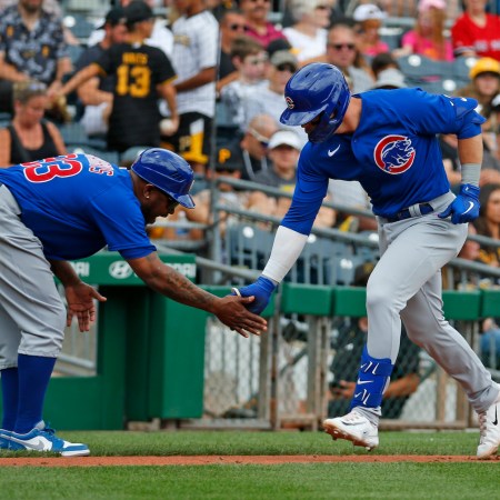 two baseball players high fiving