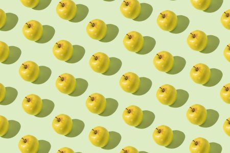 green apples against green background