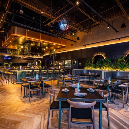 nside bar and seating area at La Popular.