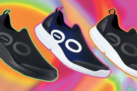 Oofos Shoes on a gradient backdrop