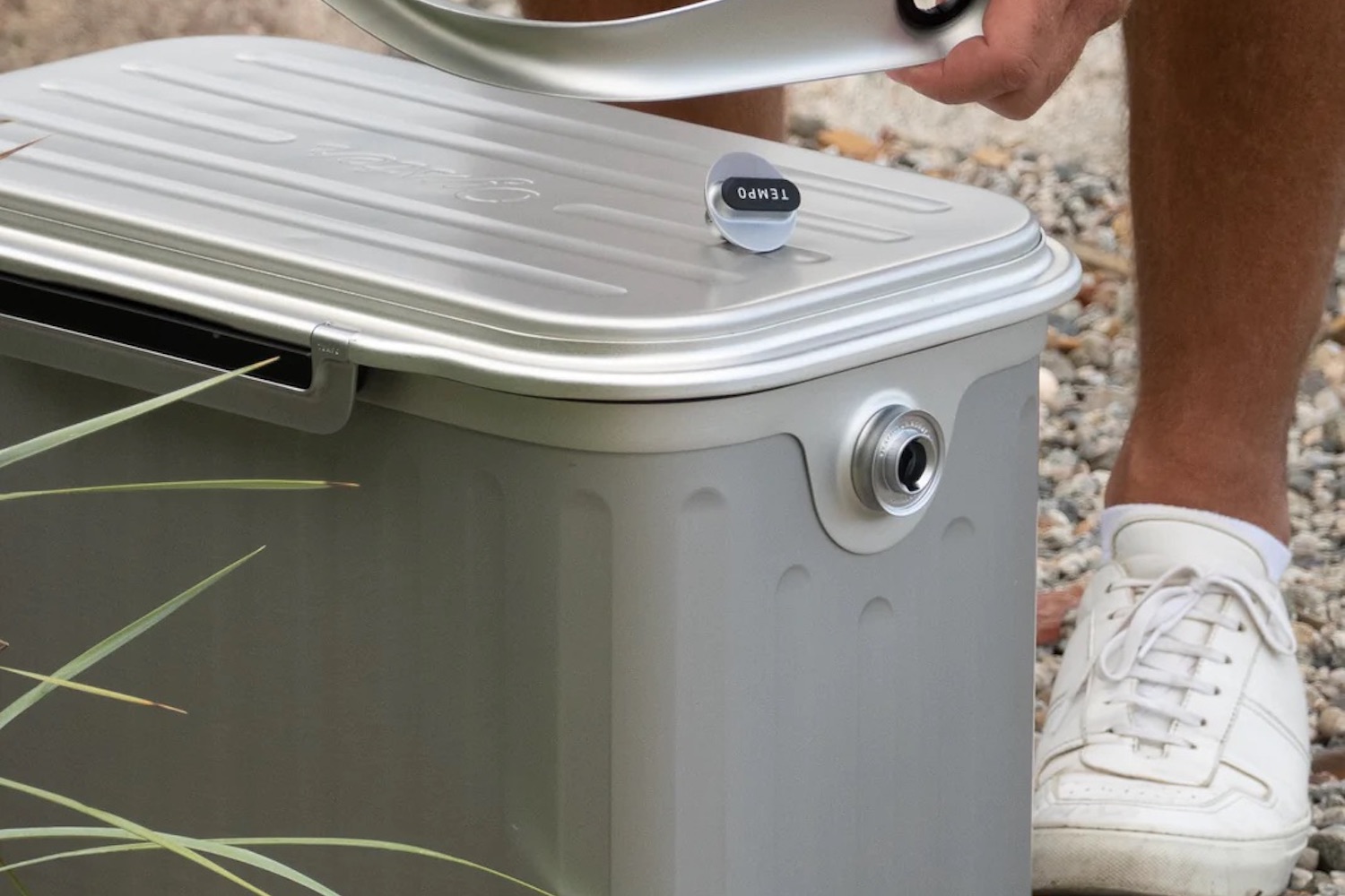 an Oyster Tempo Bundle cooler on a grass