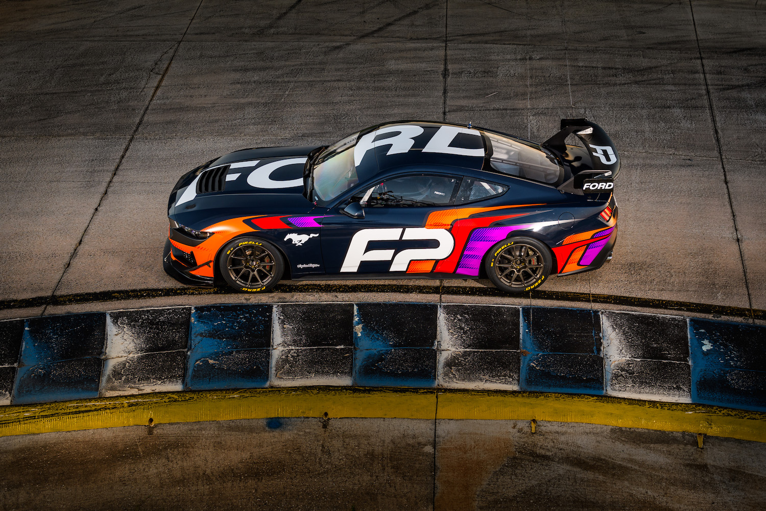 black orange and purple and red sports race car