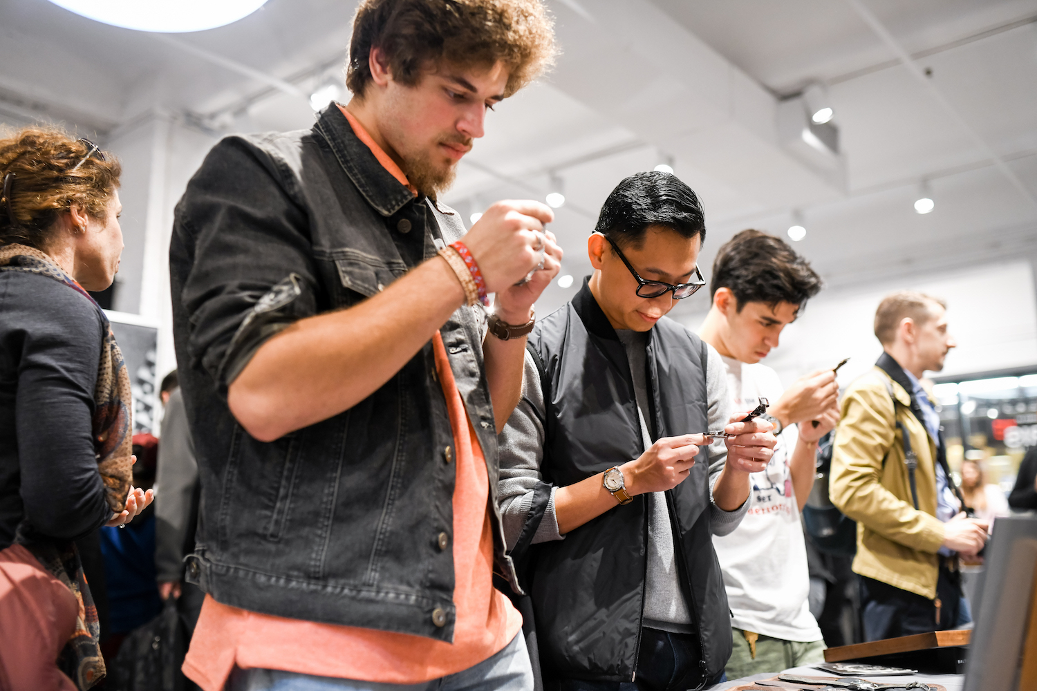 people looking at watches