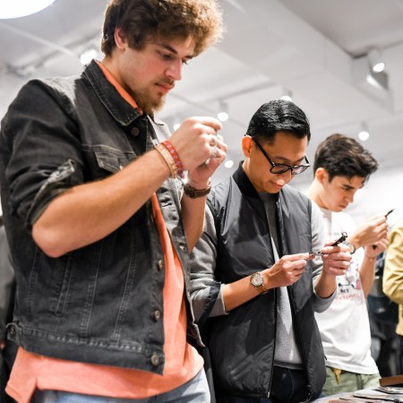 people looking at watches