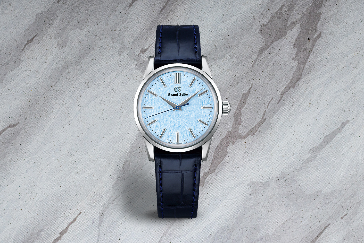 a black and light blue watch