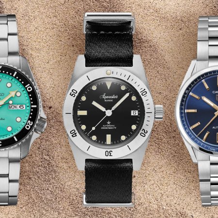watches on sand.