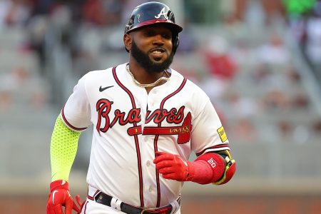 Marcell Ozuna of the Braves rounds second base.