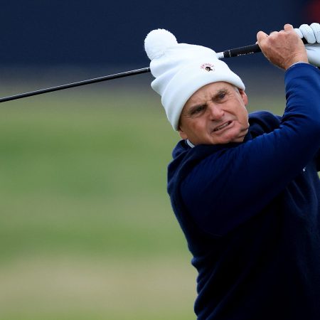 Jimmy Dunne of U.S. investment bank Piper Sandler plays a shot at St. Andrews.