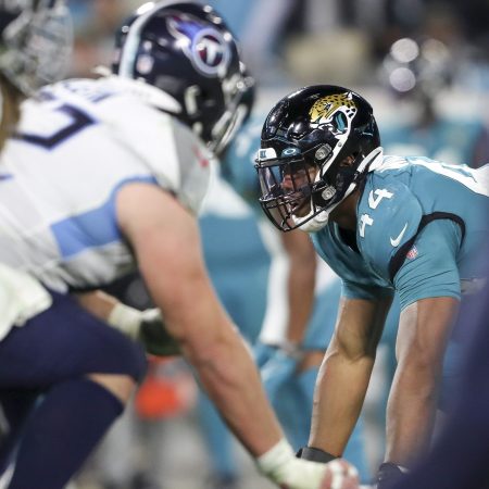 Travon Walker of the Jaguars lines up before a play against the Titans.