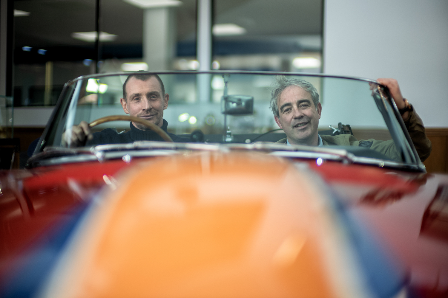 Nick and Giles English sitting in a car.