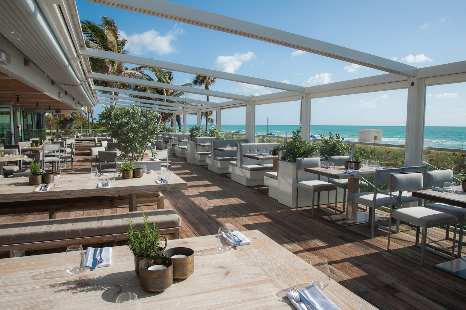 Outdoor seating section in front of beachy area