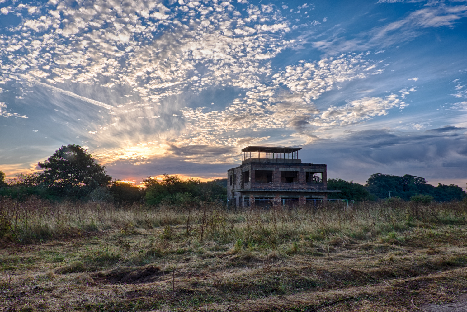 An abandoned military air base at sunrise in the U.K. A similar structure is set to be converted into a residence.