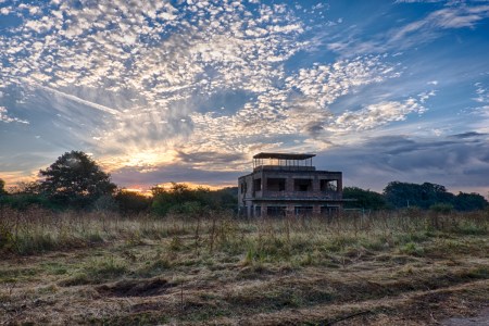 An abandoned military air base at sunrise in the U.K. A similar structure is set to be converted into a residence.