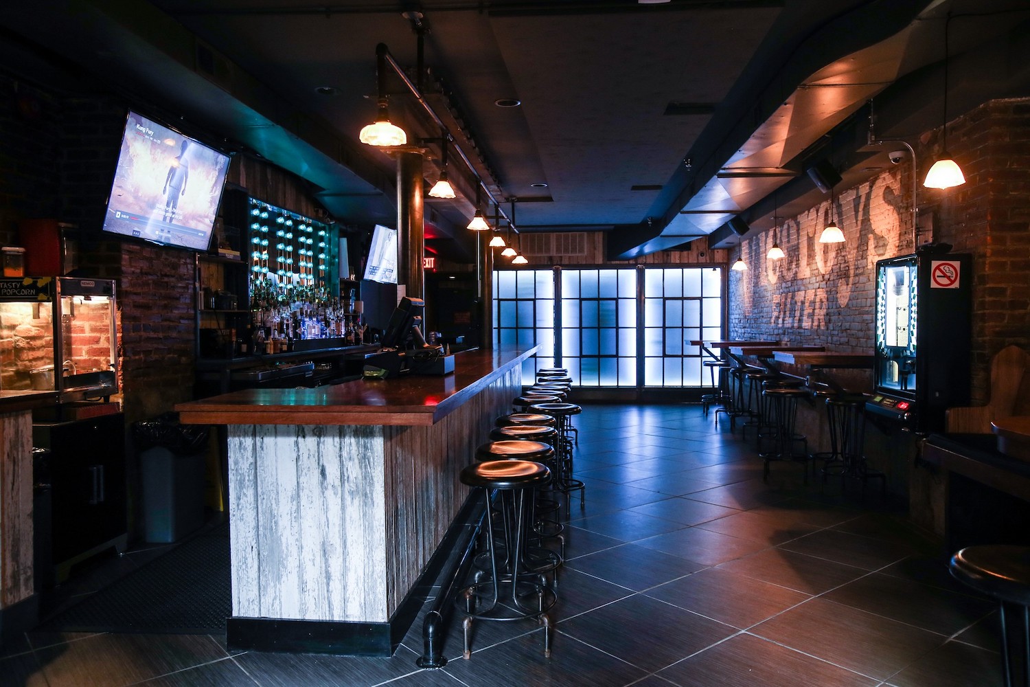 Blue-tinted underground bar