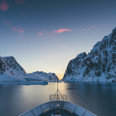 An expedition ship cruising the Antarctic peninsula