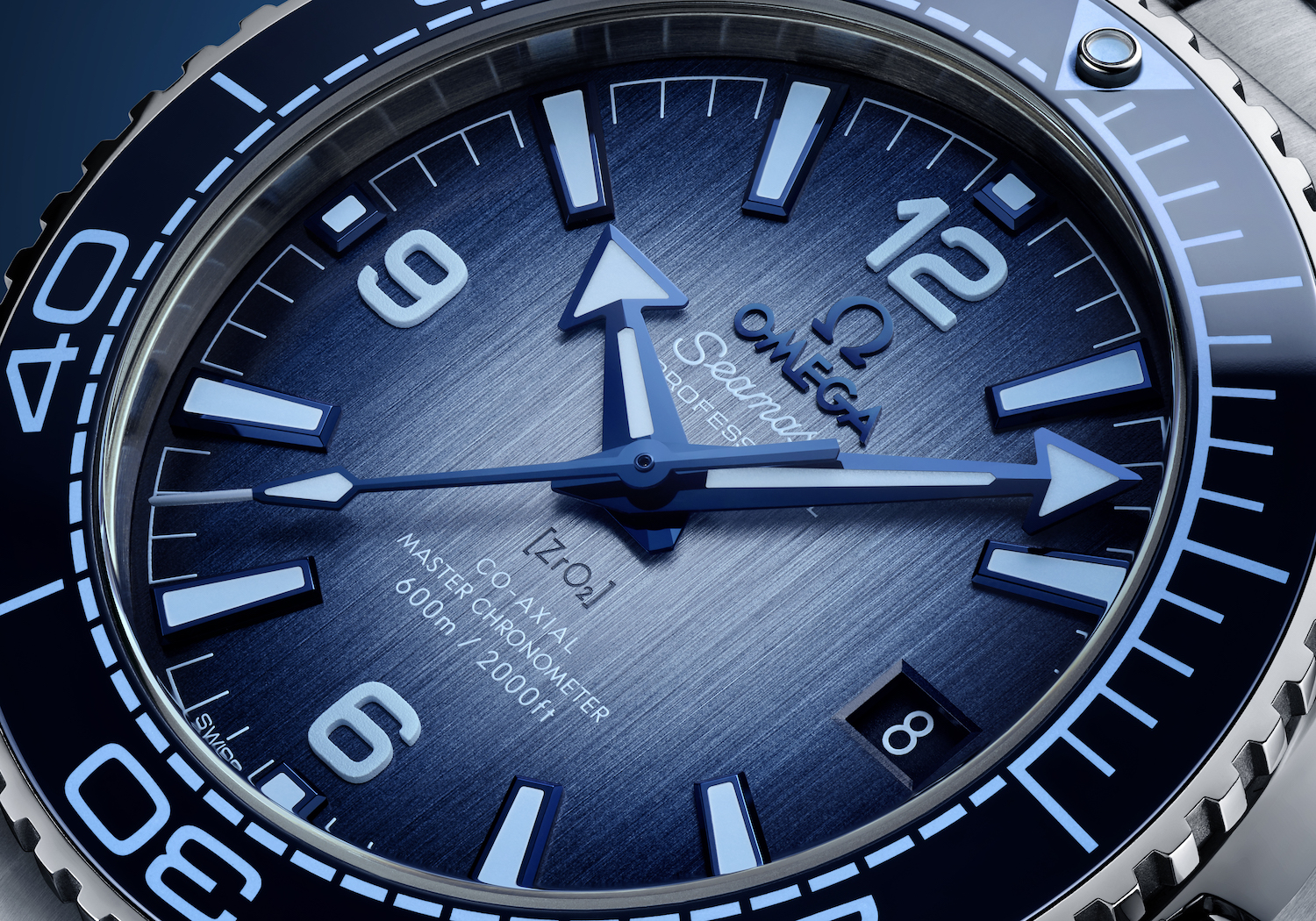 Close-up of watch face with multi-colored blue details