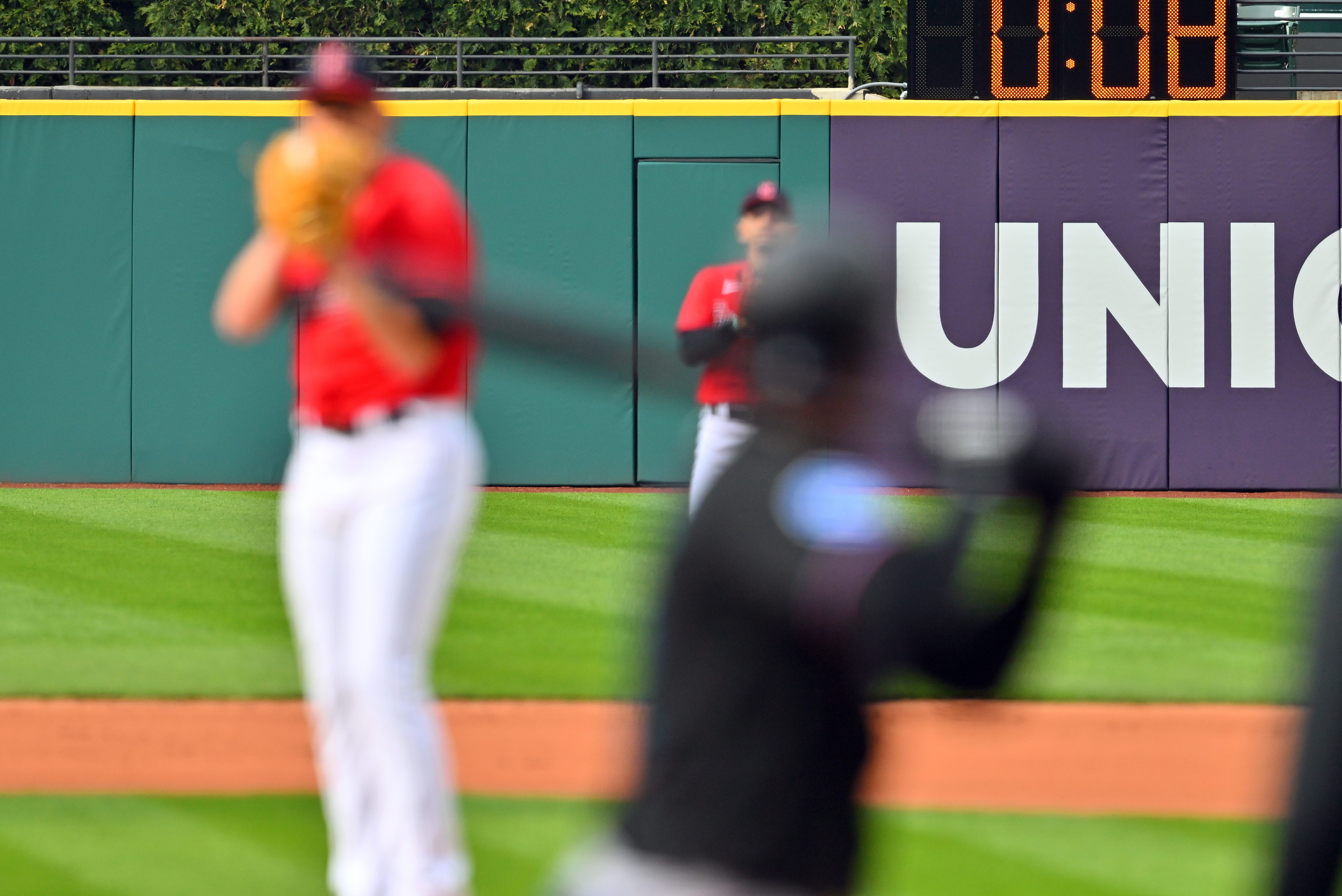 The pitch clock is seen behind a starting pitcher.