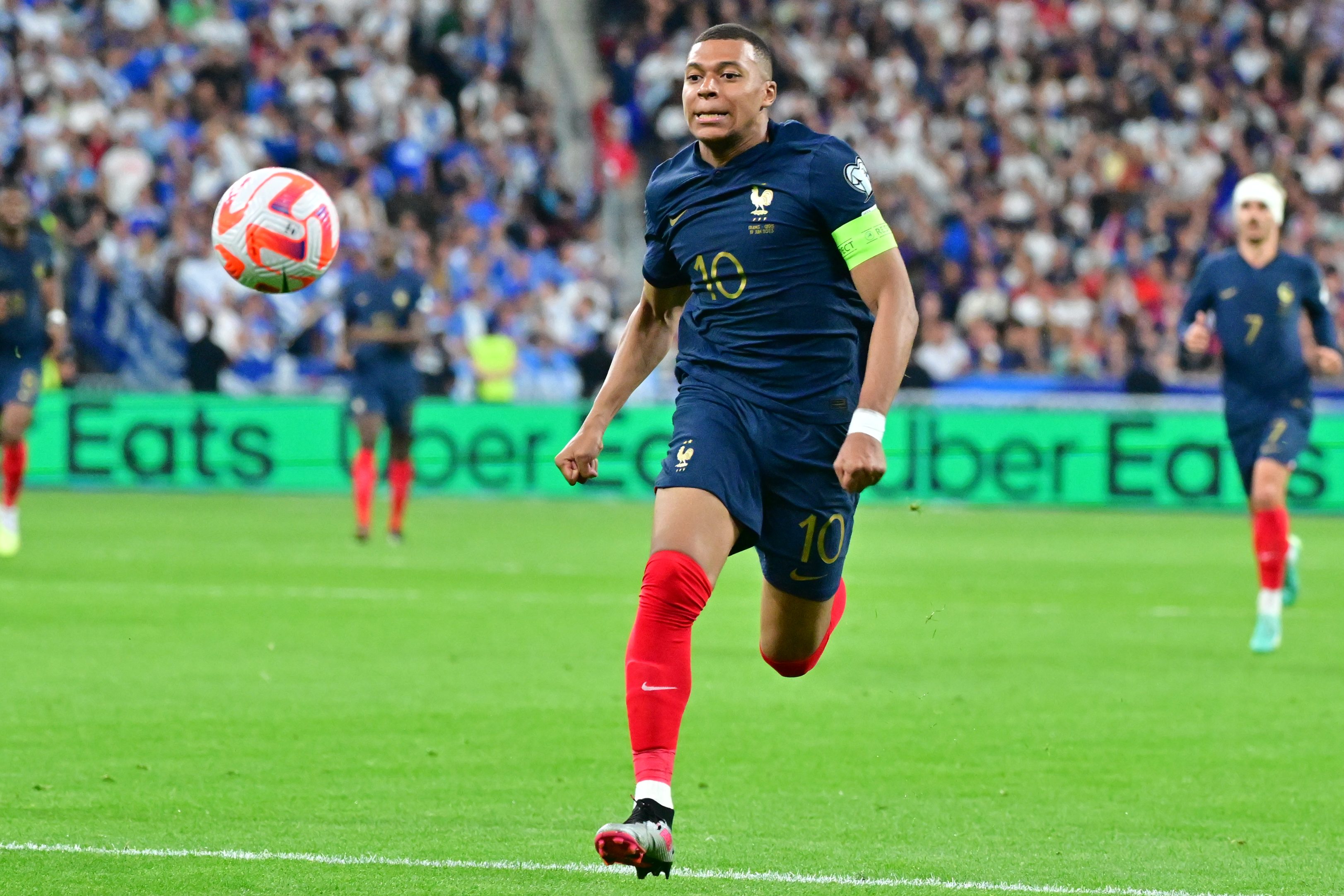 Kylian Mbappé of France goes for the ball during a match against Greece.