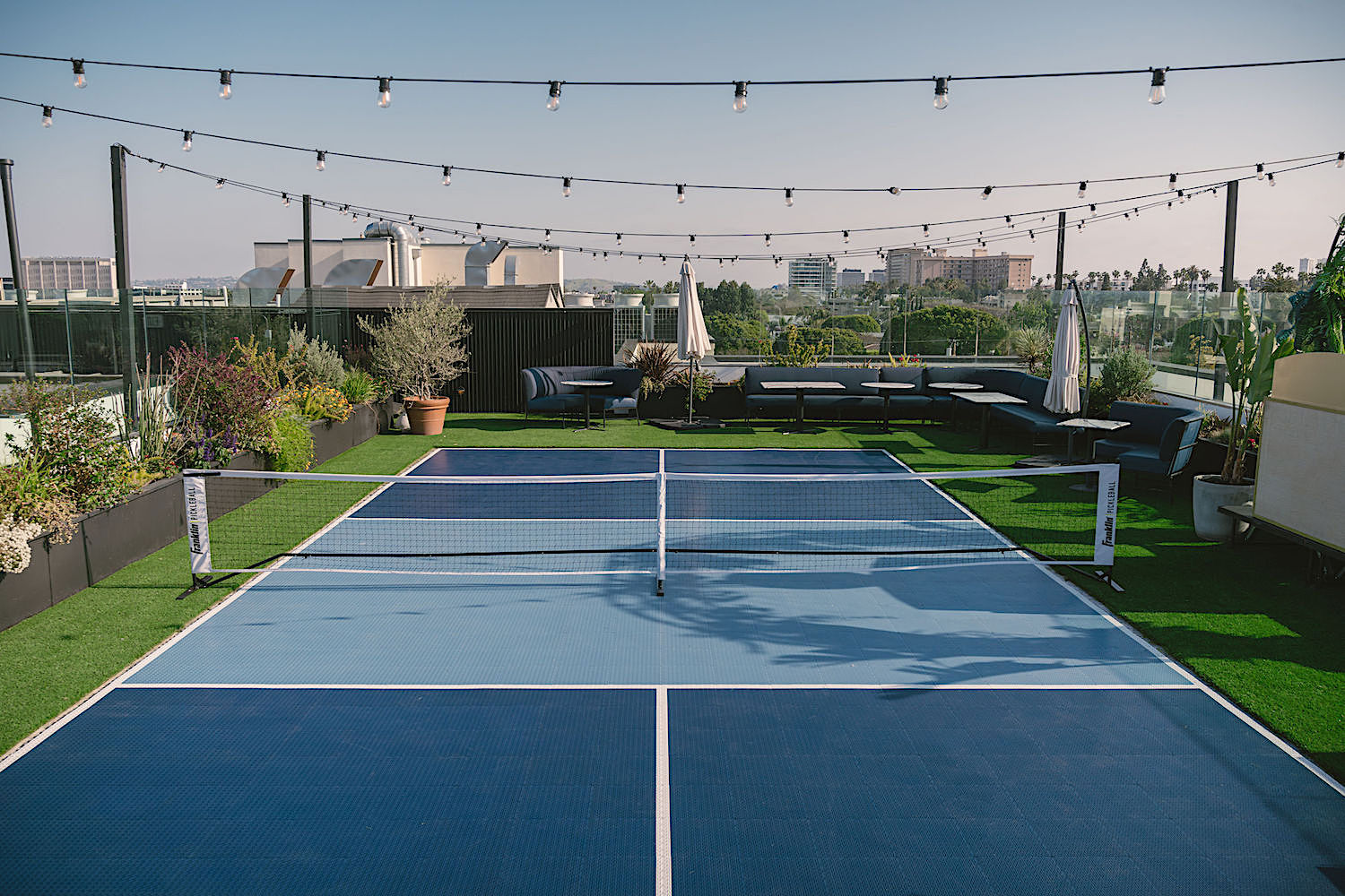 pickleball court with string lights