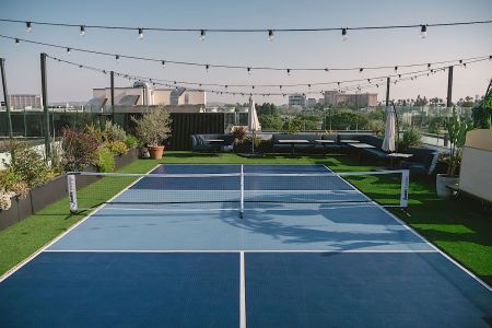 pickleball court with string lights
