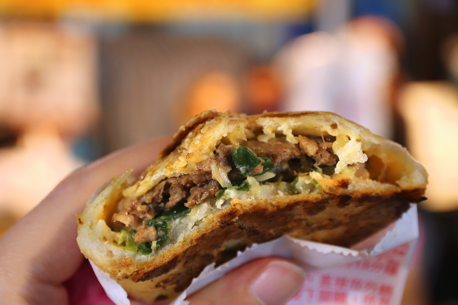 A black pepper bun with pork at Raohe Night Market