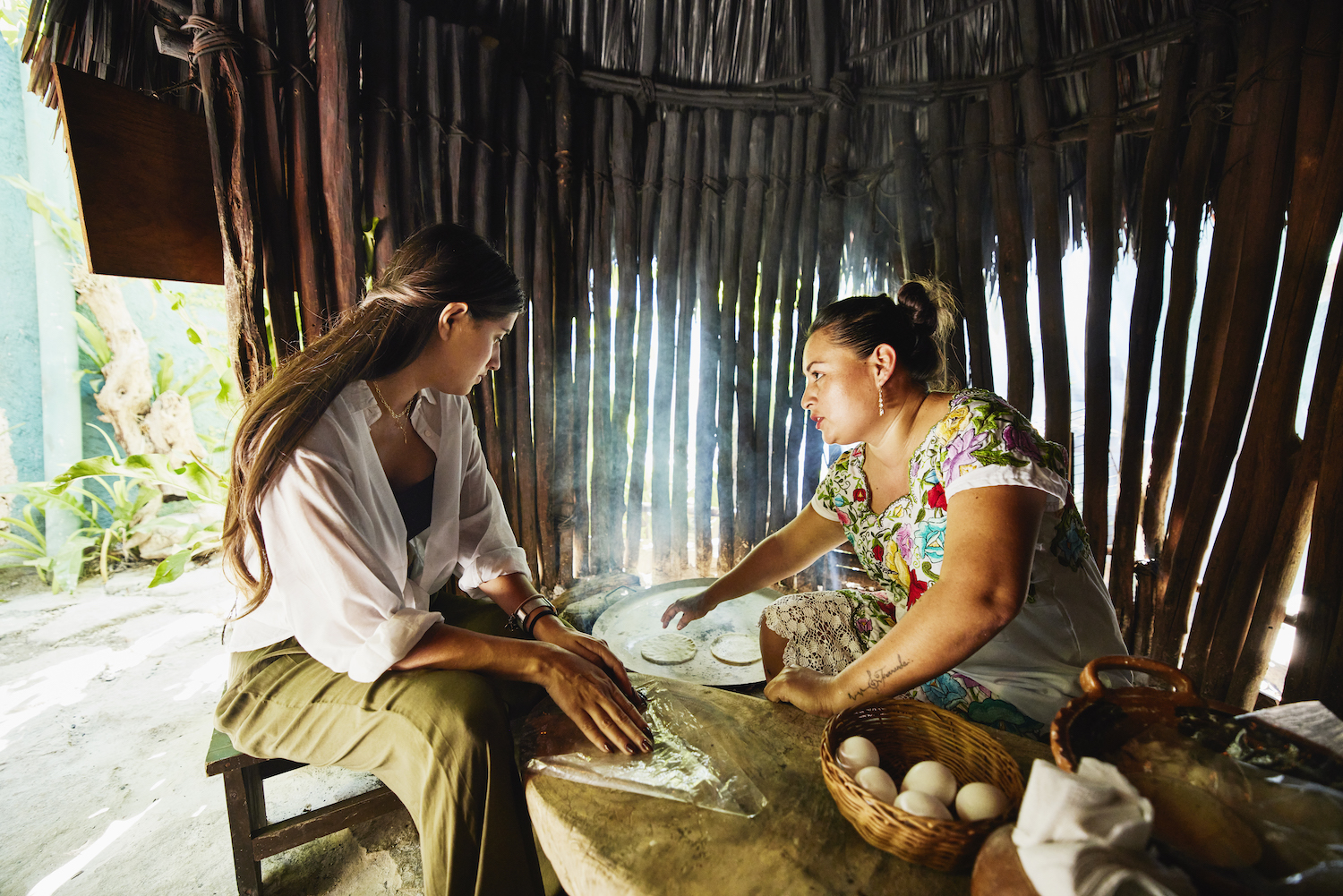 Learning to make egg-filled tortillas during a traditional Mayan cooking class