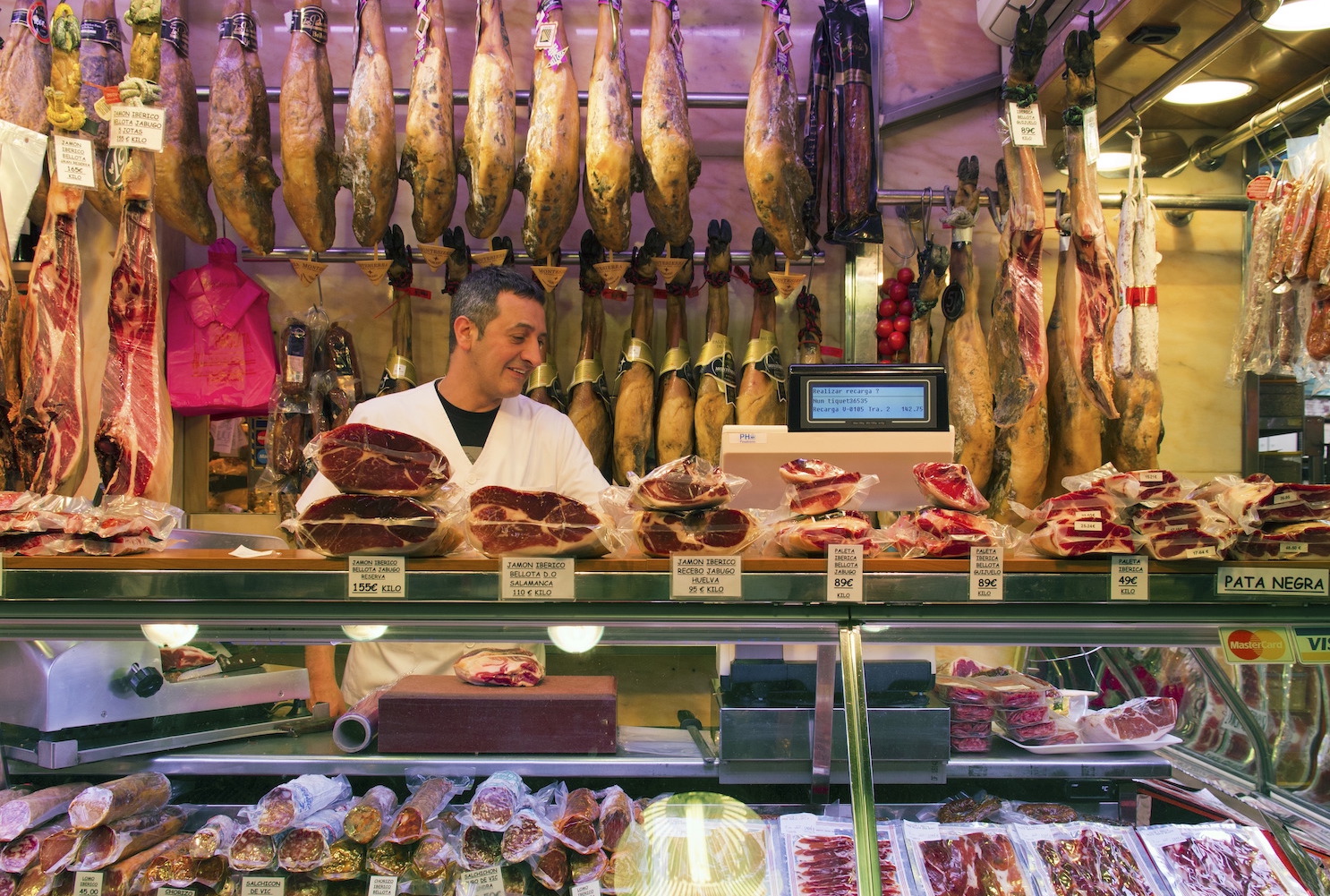 A jamón and sausage shop in Boqueria Market