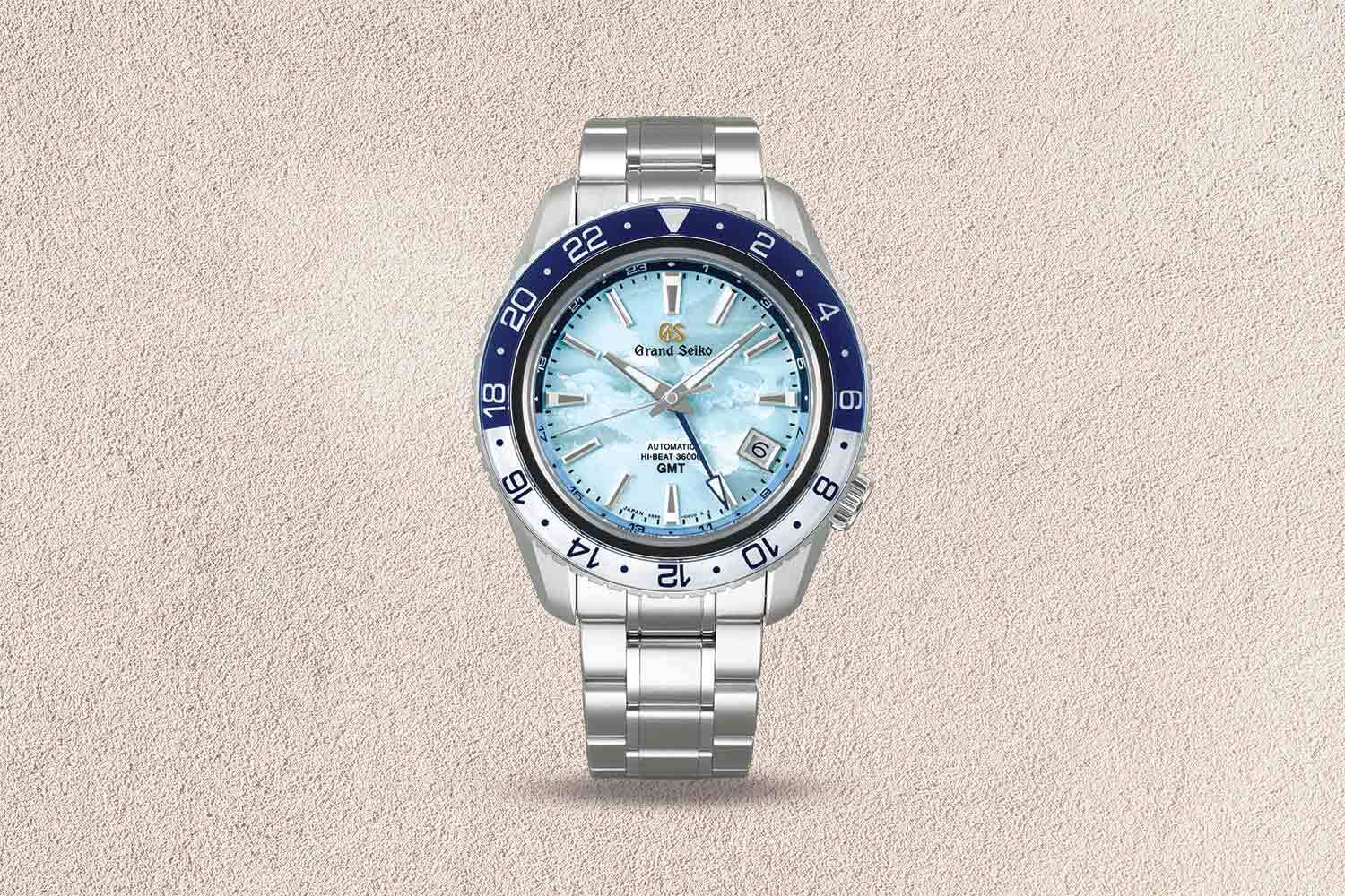Silver and blue watch