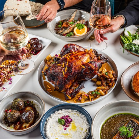 Spread of food and wine glasses on a table