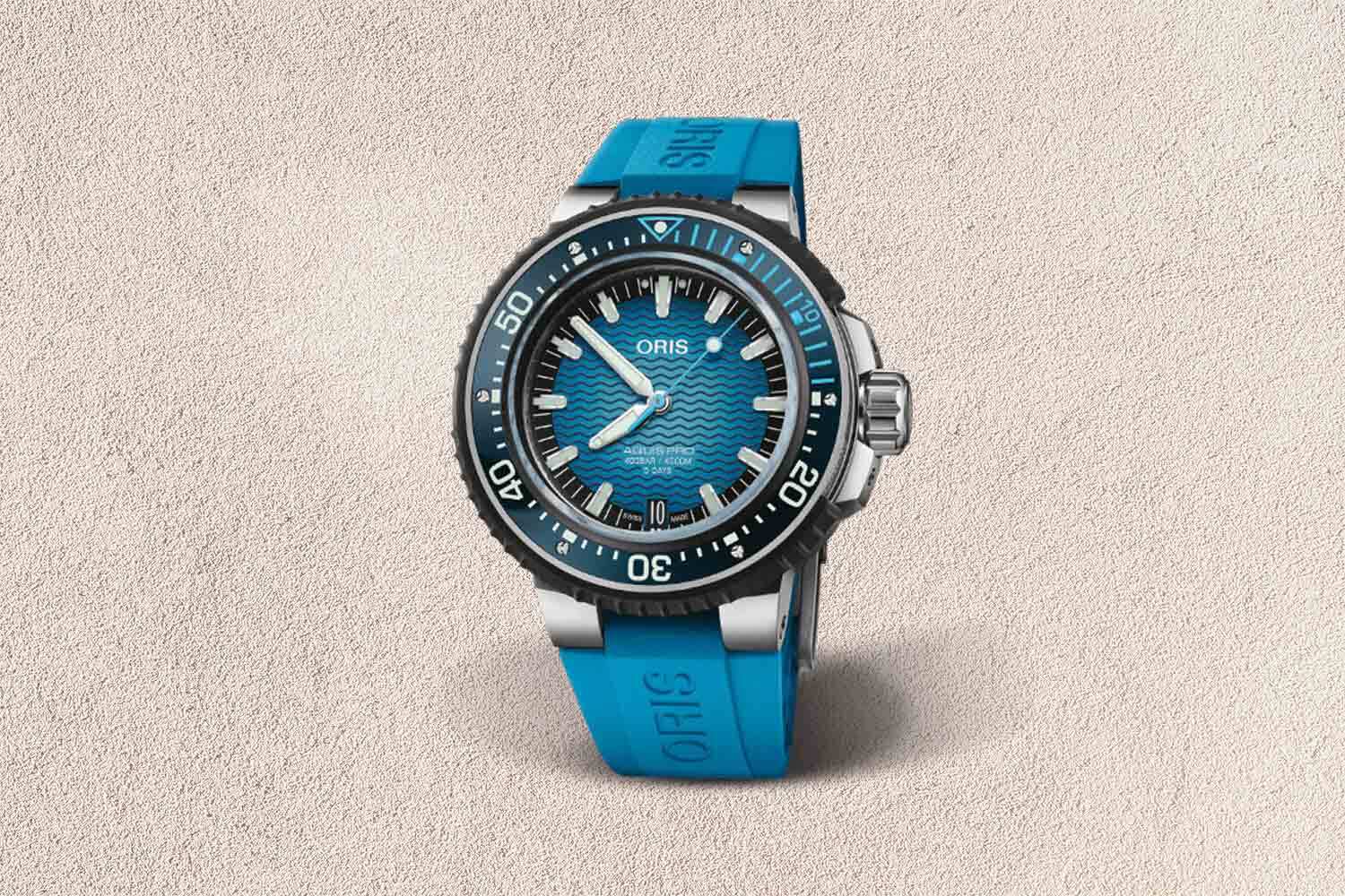 Bright blue-colored watch with wavy patterns and black, white and silver accents