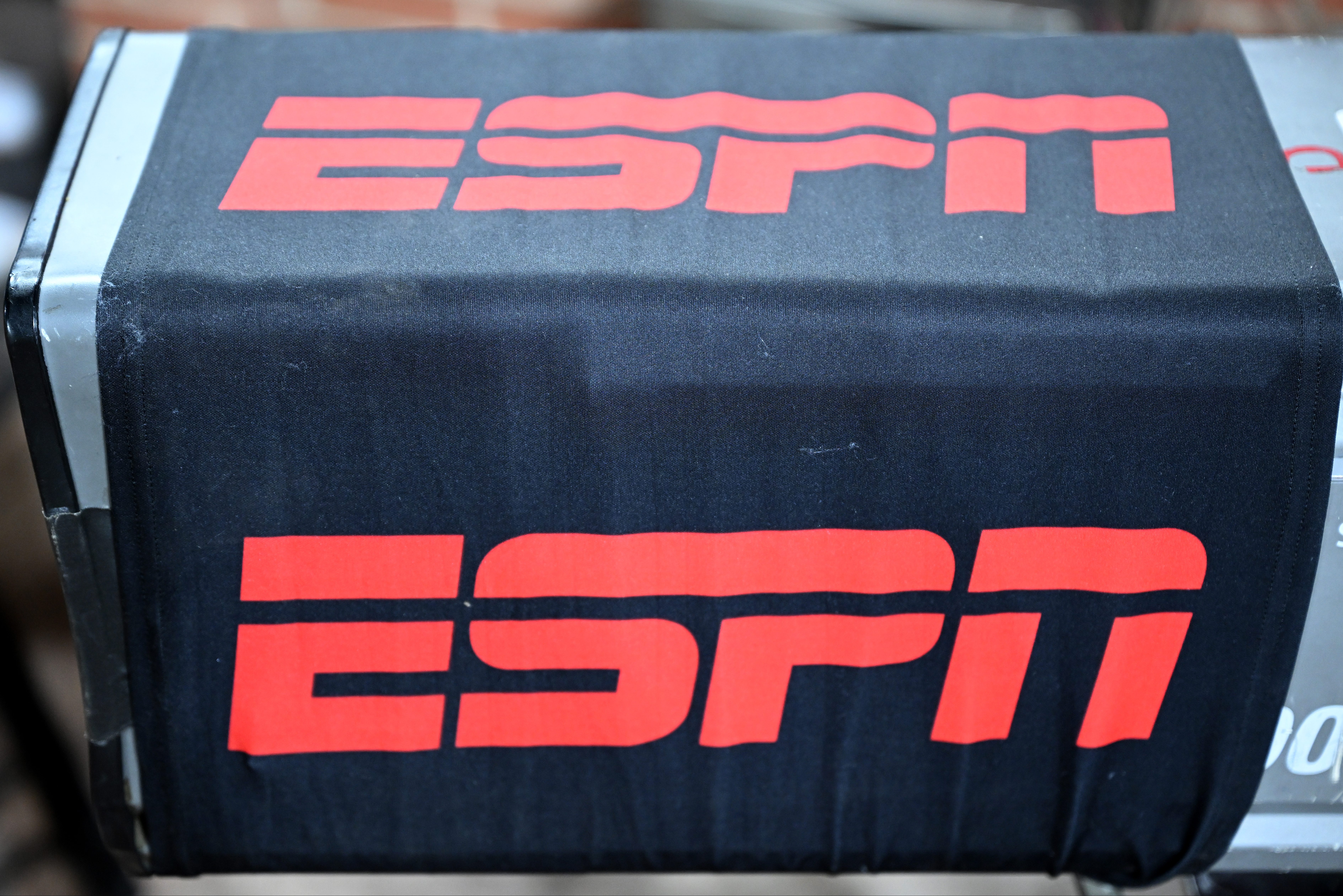 A view of the ESPN logo on a camera at a game.