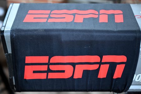 A view of the ESPN logo on a camera at a game.