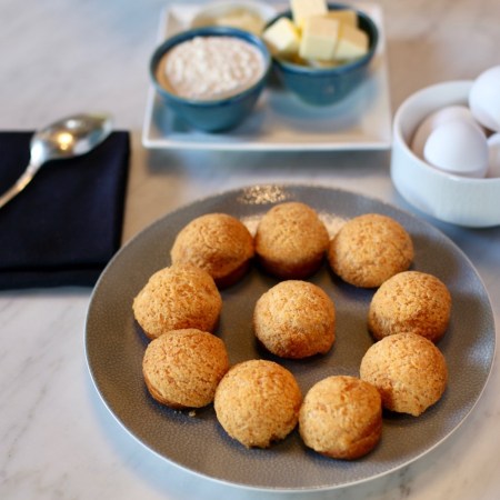 gougères - small yellowish balls on a plate