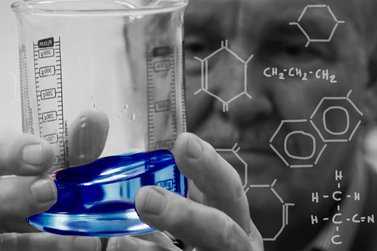 Professor David Nutt holding a beaker in a science lab. Nutt says he's created a non-alc drink that replicates the buzz of booze