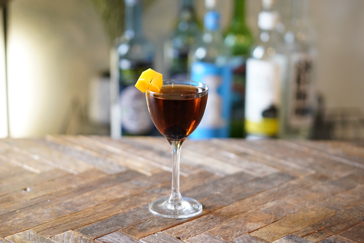 tequila manhattan on a wooden table