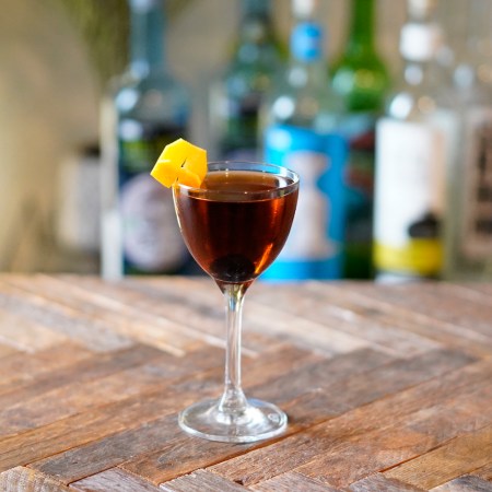 tequila manhattan on a wooden table