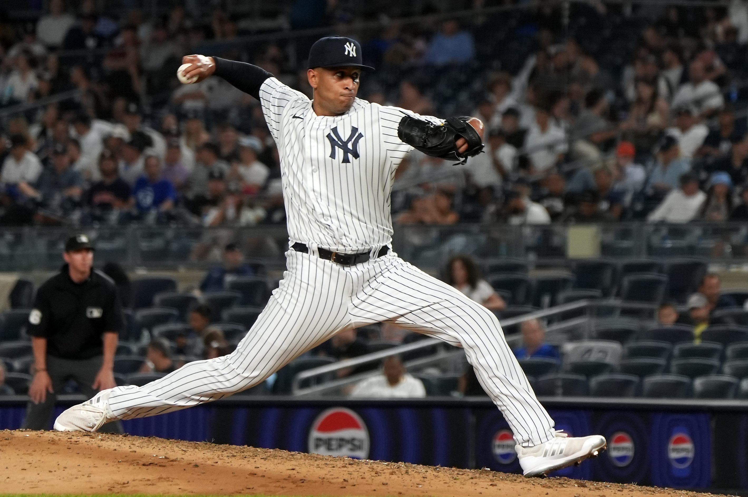 Keynan Middleton pitches for the Yankees against the Astros.