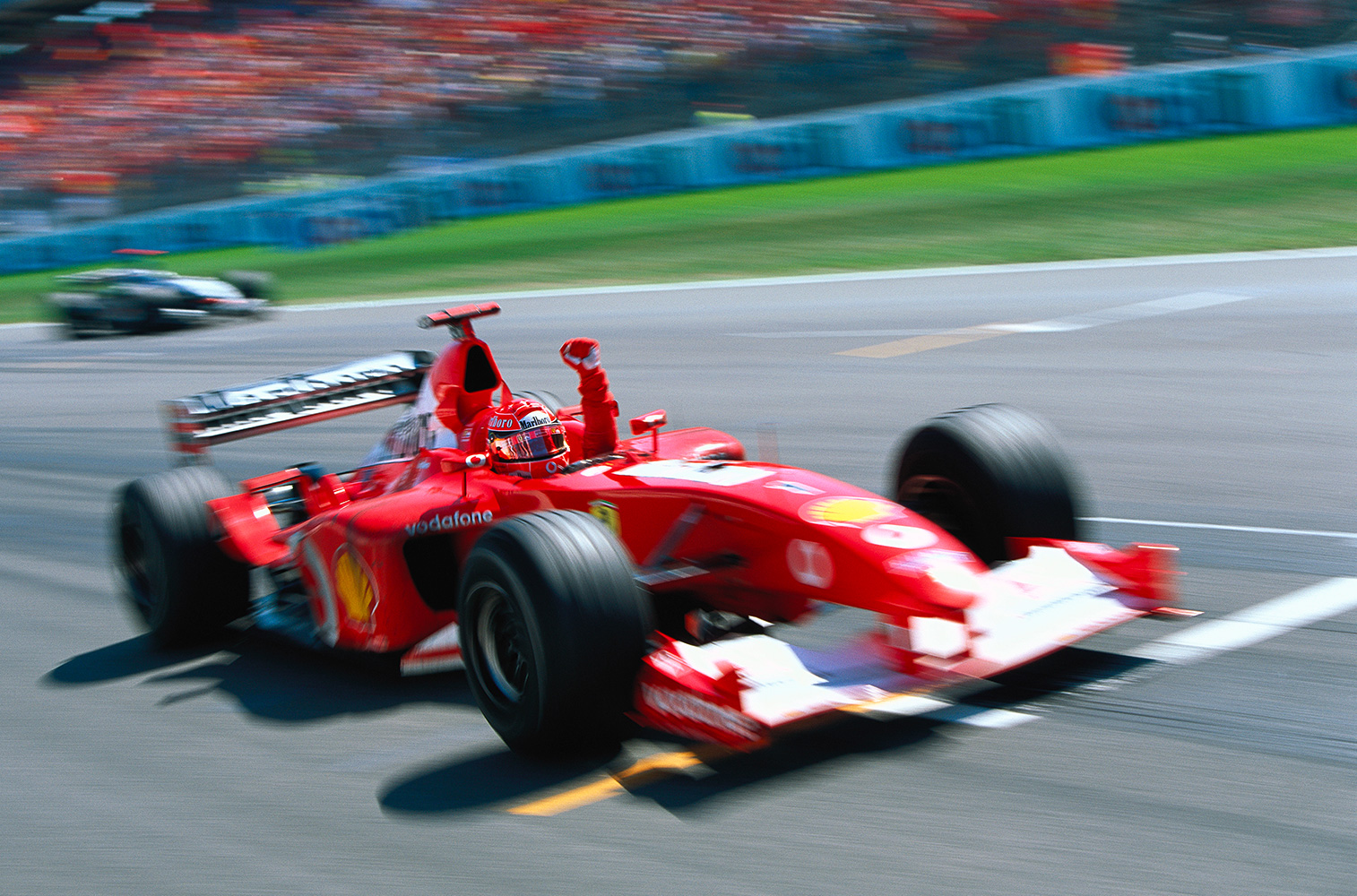 "Another win for Schumacher. With him, Jean Todt and Ross Brawn, Ferrari were unbeatable in the early 2000s." 