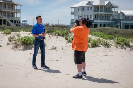 Houston meteorologist Adam Krueger reporting on location, but he's more famous for his in-studio segments that go viral on TikTok and Instagram