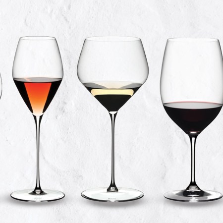 riedel wine glasses on a grey background