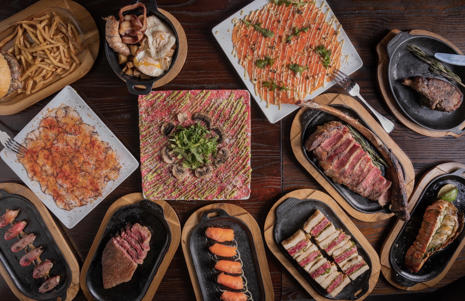 Varieties of steak on plates