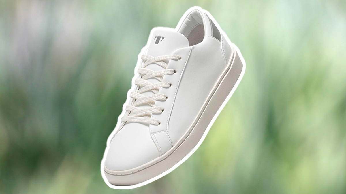 A Thousand Fell Lace Up Sneaker on a green background