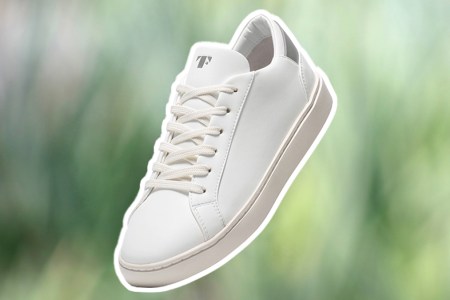 A Thousand Fell Lace Up Sneaker on a green background