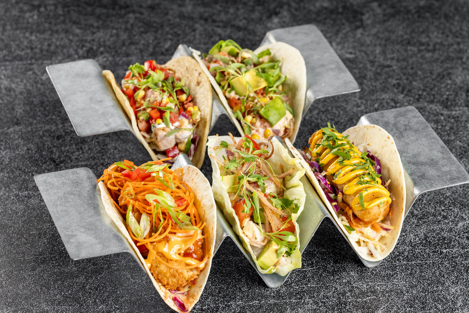 Rows of assorted tacos