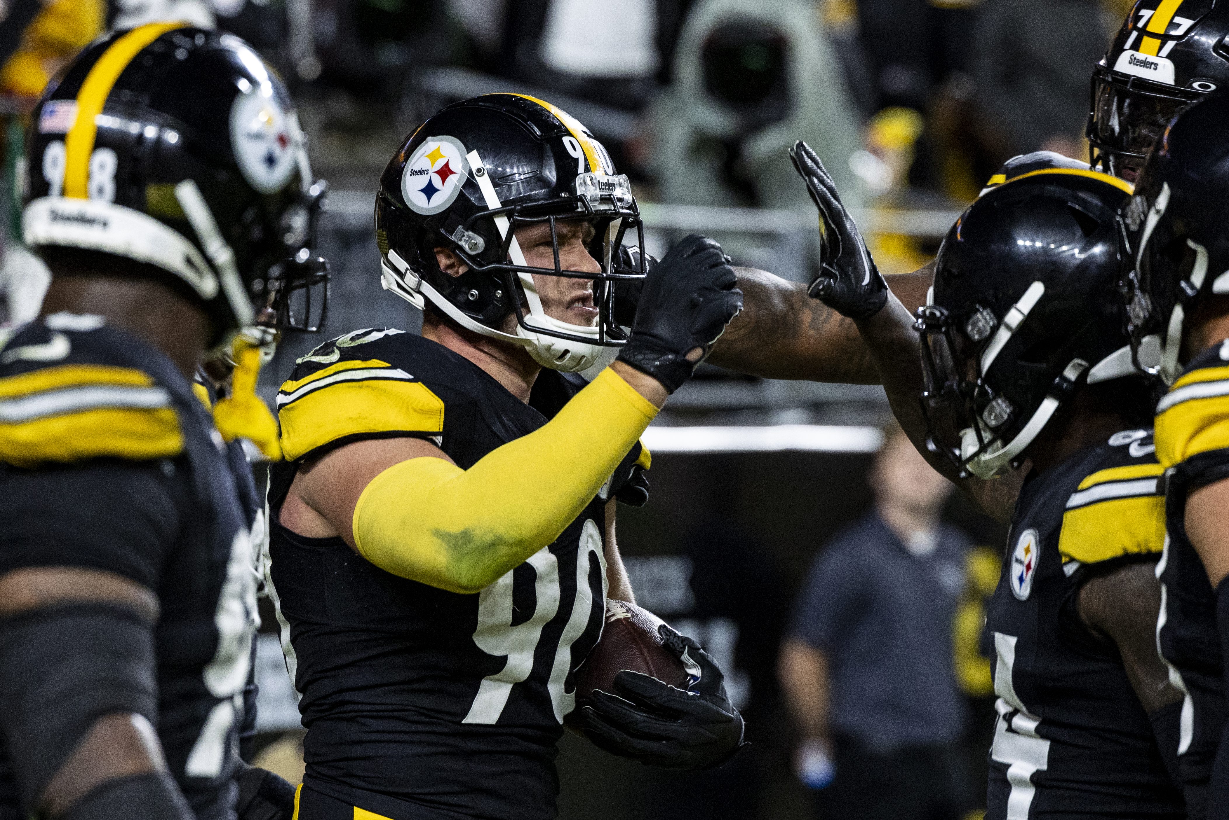 T.J. Watt of the Steelers celebrates after scoring a touchdown.